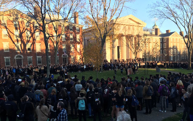Student walkout at Brown University crowd of people in front of campus building