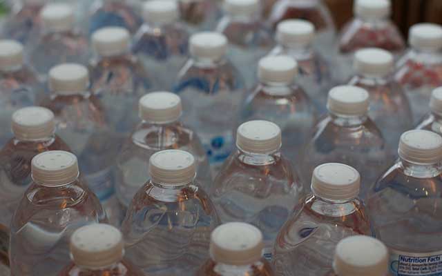 Plastic water bottles in rows
